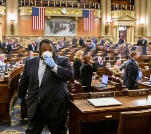 The Pennsylvania Senate has approved a bill that would require first responders to be informed if a person has COVID-19. (Photo/TNS)