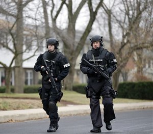 Police search for suspect Bradley William Stone, Tuesday, Dec. 16, 2014, in Pennsburg, Pa. (AP Image)