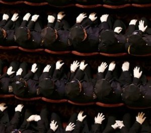 New police officers attend their graduation ceremony at the Beacon Theatre in New York, Thursday, Dec. 28, 2017.