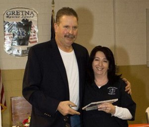 Lt. Pernice White (right) is shown accepting the Captain's Choice Award in 2013.