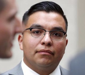 In this May 30, 2017, file photo, St. Anthony police officer Jeronimo Yanez stands outside the Ramsey County Courthouse while waiting for a ride in St. Paul, Minn.
