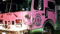Pink fire truck overturns en route to breast cancer event
