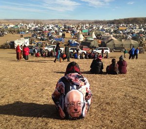 Protesters gather at an encampment on Saturday, Nov. 26, 2016, a day after tribal leaders received a letter from the U.S. Army Corps of Engineers that told them the federal land would be closed to the public on Dec. 5, near Cannon Ball, N.D.