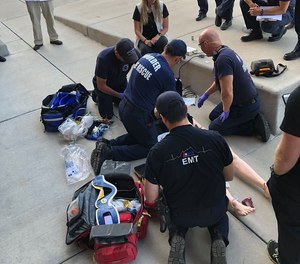 This photo shows AMR and Boulder Fire-Rescue crews receiving training in pit crew resuscitation. The agencies are adopting the model following its success at the nearby Longmont Fire Department, which has used the method for about five years.