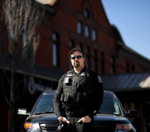 Spokane police Officer Richie Plunkett is risking his health and safety to work with homeless and disadvantaged individuals during the COVID-19 pandemic.
