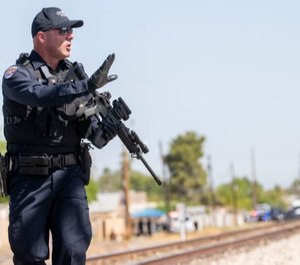 Chandler police took a suspect barricaded in a home into custody after three officers were shot.