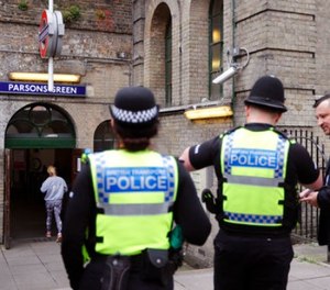 Police forces guard the entrance following Friday's incident on a tube at Parsons Green Station in London, Sunday, Sept. 17, 2017.