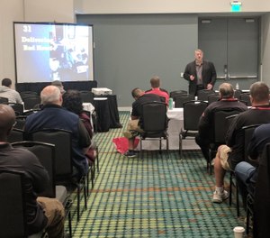 FireRescue1 Editorial Advisory Board Member Gary Ludwig uses PowerPoint during a presentation at a fire service conference.