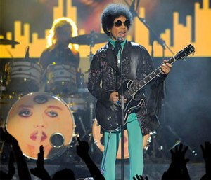 In this May 19, 2013 photo, Prince performs at the Billboard Music Awards at the MGM Grand Garden Arena in Las Vegas. Several pills taken from Prince's estate in Paisley Park were revealed to contain fentanyl.