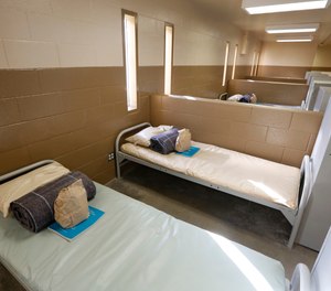 The federal judge will give the state three months to ensure it has enough healthcare professionals to meet constitutional standards.