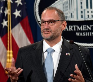 In this July 19, 2019, file photo, acting Director of the Bureau of Prisons Hugh Hurwitz speaks during a news conference at the Justice Department in Washington.