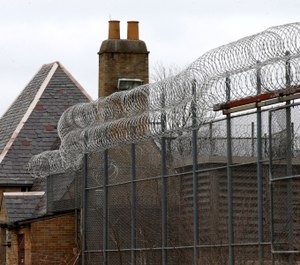 In this March 15, 2019, file photo, the abandoned, former Dwight Correctional Center, also known as Oakdale Reformatory for Women, and Illinois Penitentiary for Women, is seen in Dwight, Ill. The town of Dwight approved an annexation and rezoning of land that would allow Immigration Centers of America to get one step closer to building an immigration detention center in the Chicago area. (Antonio Perez/Chicago Tribune via AP, File)