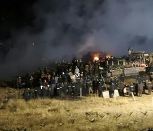 Law enforcement and protesters clash near the site of the Dakota Access pipeline on Sunday in Cannon Ball, N.D.