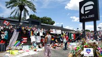 Scores gather outside Pulse nightclub to honor massacre victims