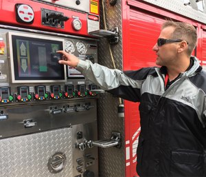 Jason Cerrano, owner and inventor of Phantom Controls, shows the automated screen on the rig that runs the pumps.