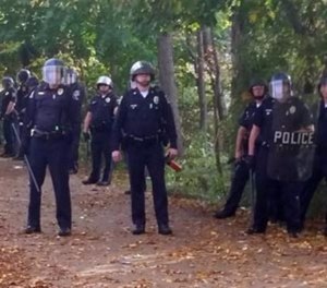 Local police, firefighters and ambulances in New Hampshire responded to large crowds of students as the annual Pumpkin Festival was underway near Keene State College Saturday, Oct. 18, 2014.
