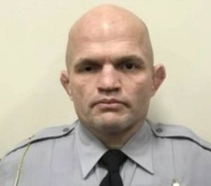 One of the brothers told law enforcement that they planned to hunt for deer, but ended up killing the deputy (pictured), the warrants state.