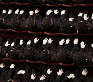 New police officers attend their graduation ceremony at the Beacon Theatre in New York, Thursday, Dec. 28, 2017.