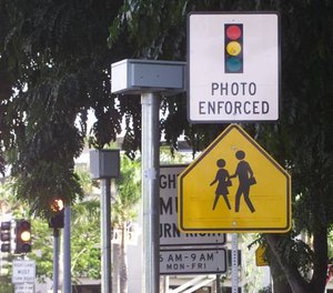 Hawaii counties would be authorized to establish three-year programs to test out a new system for ticketing people who run red lights.