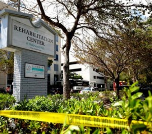 This Sept. 13, 2017, file photo, police surround the Rehabilitation Center in Hollywood Hills, Fla. (John McCall/South Florida Sun-Sentinel via AP, File)