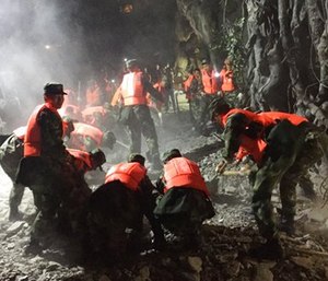 Rescuers work at a tourist site in Zhangzha in Jiuzhaigou county in southwestern China's Sichuan province.