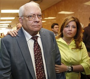 Robert Bates, left, leaves his arraignment with his daughter, Leslie McCreary, right, in Tulsa, Okla., Tuesday, April 21, 2015.
