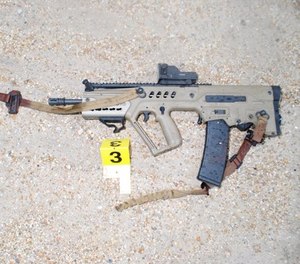 This photo shows the rifle Gavin Long used in the ambush attack.