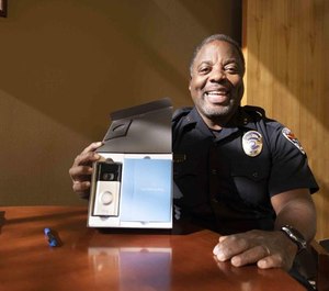 Chandler Police Commander Ed Upshaw shows the Ring kit, calling it a valuable tool in the fight against property and other crimes.