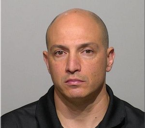 Milwaukee Fire Lt. Robert Olson, 44, was arrested Nov. 20 and faces a sexual assault charge for alleged offenses against a 14-year-old girl. (Photo/Milwaukee Sheriff's Department Facebook)