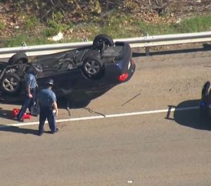 A Massachusetts trooper and three others were injured during a rollover crash. (Photo/TNS)