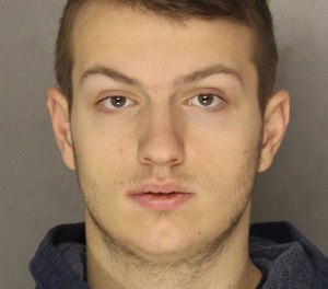 Ryan Laubham, 19, was sentenced to 18 months to three years in prison and then seven years of probation after pleading guilty to setting two porch fires because he was bored. (Photo/Allegheny County Jail)