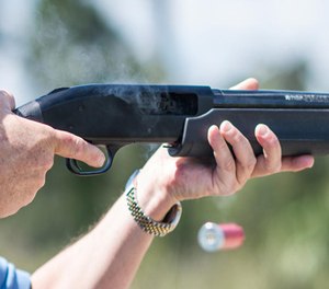 In this photo taken April 7, 2016, Jonathan Mossberg, whose iGun Technology Corp. is working to develop a