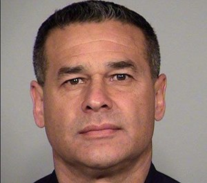 This undated image released by the San Antonio Police Department shows 20-year police veteran, Det. Benjamin Marconi, 50, who was shot and killed Sunday, Nov. 20, 2016, while on duty in San Antonio, Texas.