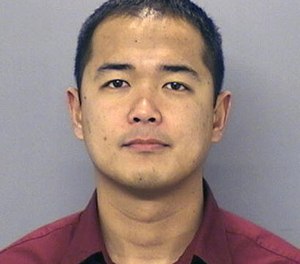 This undated file photo provided by the San Diego Police Department shows San Diego Police officer Jonathan De Guzman.