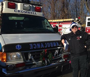 Heather Lee, a paramedic student and Cromwell volunteer, prepares for the Santa Run.