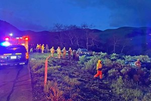 Two Santa Barbara County firefighters were struck at the scene of a rollover crash.