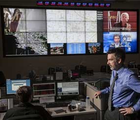 In this photo taken Friday, June 29, 2012, Jeff Brantingham, anthropology professor at the University of California Los Angeles, displays a computer generated "predictive policing," zones at the Los Angeles Police Department Unified Command Post (UCP) in Los Angeles. (AP Photo/Damian Dovarganes)