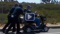 Video: Calif. cops push Army vet stranded on scooter home