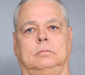This undated photo provided by the Broward County, Fla., Sheriff's Office shows Scot Peterson.