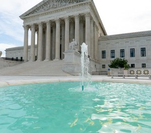 The Supreme Court is seen in Washington, early Monday, June 15, 2020. (AP Photo/J. Scott Applewhite)