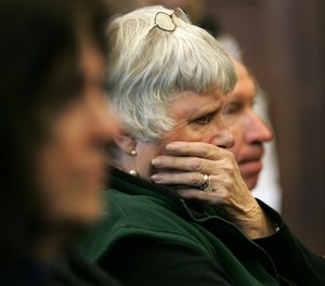 Shelia Mulligan Donovan, sister of slain Boston Police Detective John Mulligan, listens during a sentencing hearing for Terry Patterson at Suffolk Superior Court in Boston, Tuesday, Feb. 7, 2006. Prosecutors charged that Patterson was present when Sean Ellis fatally shot Mulligan in September 1993. (AP Photo/Steven Senne)