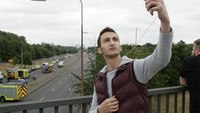 Man suspected of taking selfie at London car crash scene