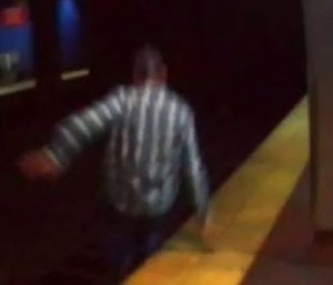 Surveillance footage shows a man jumping onto subway tracks to commit suicide. (Photo/SEPTA)