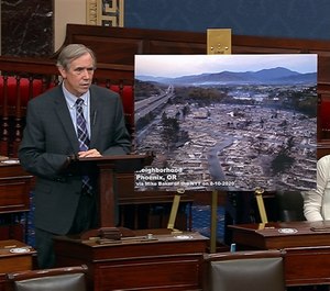 Senator Jeff Merkley (D-Ore.) speaks on the Senate floor Wednesday night, highlighting the devastation in his state.