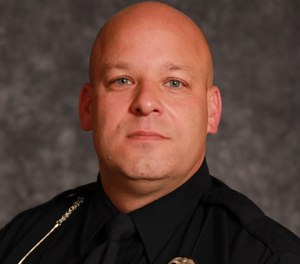 Sgt. Steven Splan, 46, suffered a fatal heart attack hours after he helped remove a tree that was blocking a roadway August 2 in Bloomfield Hills, Mich. (Photo/Bloomfield Hills Department of Public Safety)