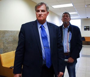 Former Tulsa officer Shannon Kepler walks out of the courtroom as the jury leaves to deliberate on his fourth court case. (Photo/AP)