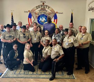 NBA legend Shaquille O’Neal poses with deputies and staff from the St. Martin Parish (Louisiana) Sheriff's Office.