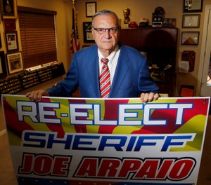 Former Maricopa County Sheriff Joe Arpaio poses for a picture in his office as he is running for the position of Maricopa County Sheriff again, Wednesday, July 22, 2020, in Fountain Hills, Ariz. (AP Photo/Ross D. Franklin)