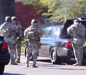 SWAT arrives on scene.