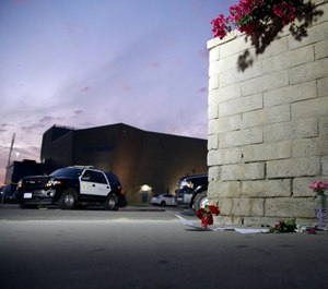 Flowers are placed in front of Saugus High School in the aftermath of a shooting on Thursday, Nov. 14, 2019, in Santa Clarita, California. (Photo/Marcio Jose Sanchez/AP)